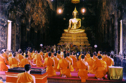 Breath taking view of the Buddha Statue of Phra Buddha Trilokachet at the Phra Ubosot / Ordination Hall at Wat Suthat