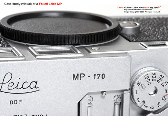 Exterior engraving of a MP S/N in a counterfeit Leica body