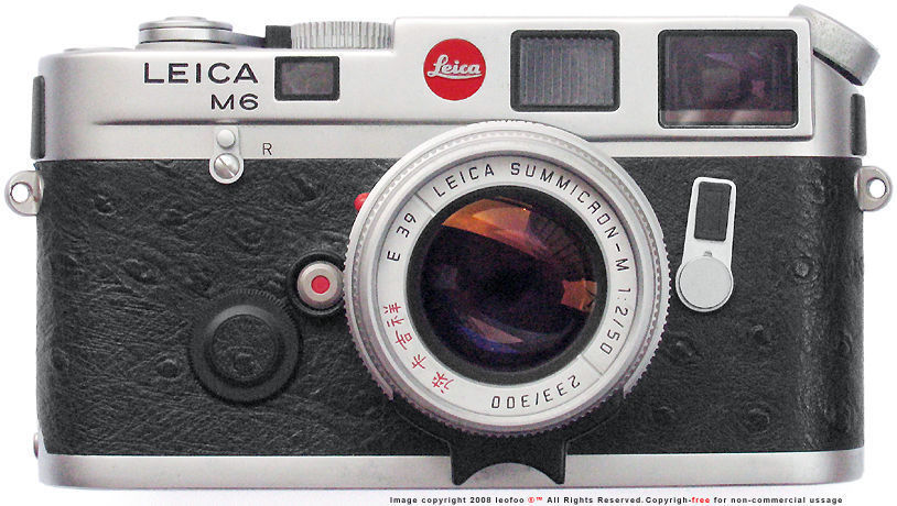 Front section view of a collectible LEICA M6 Year of the Rooster Special editon series rangefinder camera model, 1993 with macthing LEICA Summicron-M 1:2/50mm with matching srial numbering as well as Special engraving in Chinese Characters
