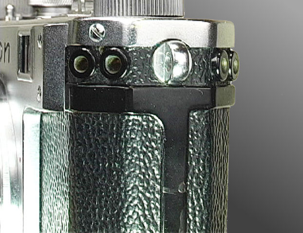 Nikon S 8 digits serial numbering sync contacts at the side