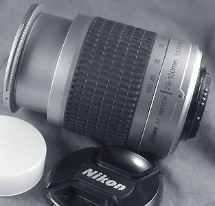 Nikon AF (Autofocus) Zoom Nikkor 28-100 f/3.5~5.6G wide-tele zoom lens with basic accessories