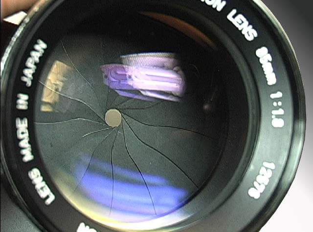 Front lens element reflective coating on RF Canon 85mm f/1.8 telephoto lenses for rangefinder Canon cameras 