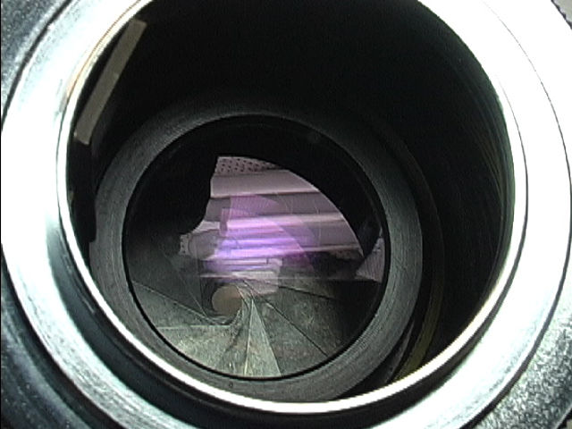 Recessed exposed lens element in  the rear lens mount of a RF Canon 85mm f/1.8 telephoto lenses for rangefinder Canon cameras 