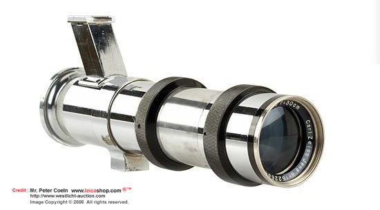 Carl ZeissCarl Zeiss Jena Tele-Tessar K 8/30cm; in Contax direct mount, non rangefinder coupled, prototype lens, some black/nickel, partly chrome finish, with a large accessory shoe mount, unique example from the former Zeiss optical lab; approx.  Year: 