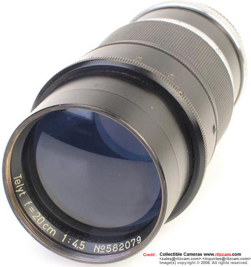 Side view and front lens element of Leica f=20cm 1:4.5 (200mm f/4.5 Telyt telephoto lens (Post War version) for Visoflex (Reflex Housing)
Distance scales marked in metric (metres). with edicated lens hood