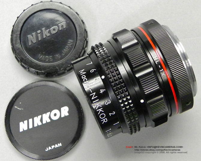 A Nippon Kogaku Nikon Macro-NIKKOR 1:6.3 f=120mm (Red-lined R-Ratio 1.2X~4X) with front and rear lens caps