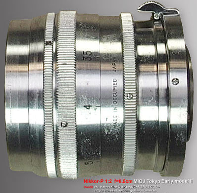 Side view of the  Nikkor-P 1:2 f=8.5cm telephoto lens for Nikon rangefinder cameras with MIOJ inscription on  the chrome lens barrel