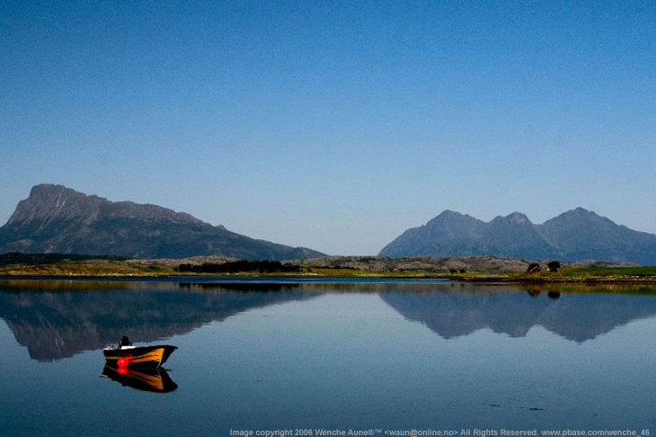 Boat in the still lake by Wenche Aune  (68k Jpeg) Loading ...