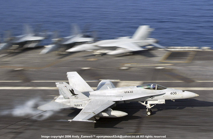 F14 Tomcat (or F18 ?) taking off from a Super Carrier