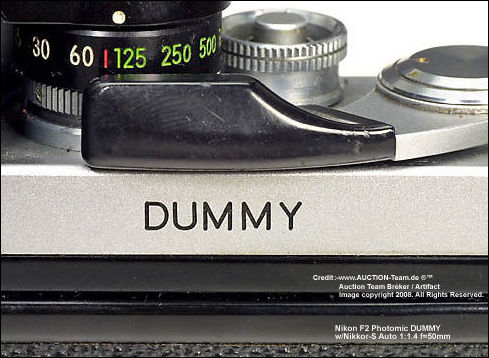 Engraving of DUMMY on Nikon F2 Photomic DUMMY display camera units with Nikkor-S Auto 1:1.4 f=50mm lens 
