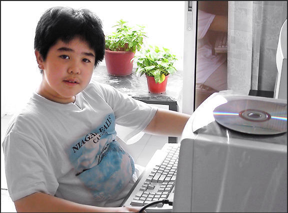 Alvin Foo @ 10 at his favourite computer desk at Bandar utama