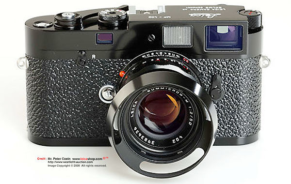 Leica MP Classic Outfit Set, Schmidt Marketing, Hong Kong  front view with 2/50mm Summicron-M black lacquered remake lens as well as lens hood attached.