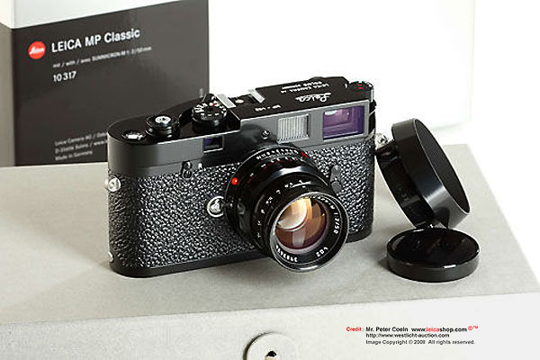Leica MP Classic Outfit Set, Schmidt Marketing, Hong Kong  front view with 2/50mm Summicron black lacquered remake lens as well as lens hood attached.