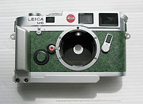 Front view of a  Leica M6 Chrome, Colombo '92 Special 500th Anniversary Edition rangefinder camera model showing lens mount and interior partial metering spot pattern