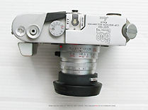 Top view of a  Leica M6 Chrome Colombo '92 Special 500th Anniversary Edition with lens attached
