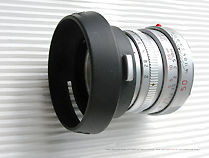 The Dedicated Special edition Summicron-M 50mm f/2.0 Colombo '92 edition with lens hood attached